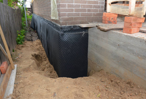 Happy homeowners after waterproofing job in Cornersville